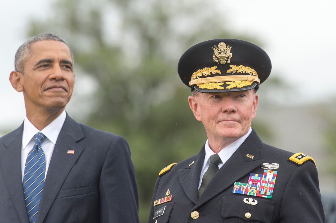 President Barack Obama, left, and Army Gen. Martin E. Dempsey, chairman of the Joint Chiefs of Staff, attend the chairman change of responsibility ceremony on Joint Base Myer-Henderson Hall in Arlington, Va., Sept. 25, 2015. DoD photo by D. Myles Cullen
