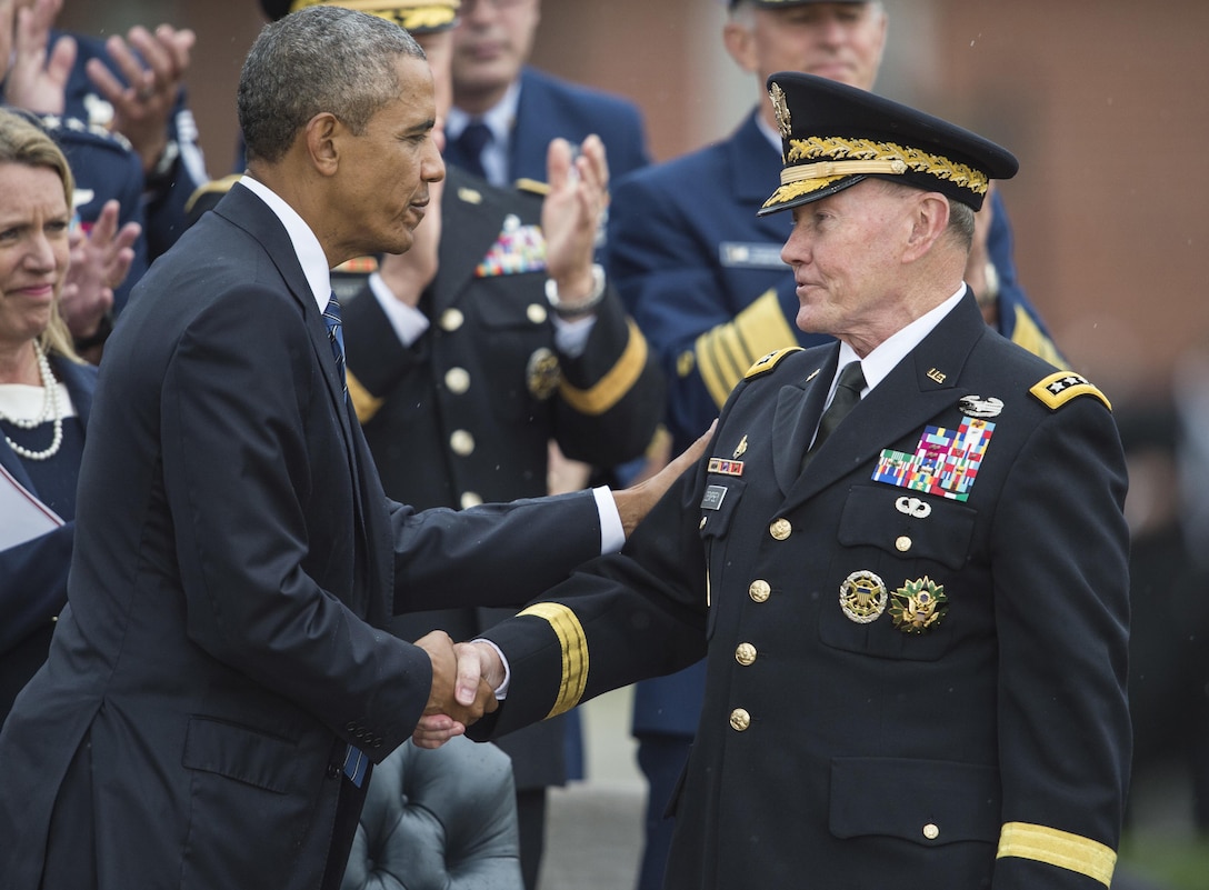 President Barack Obama, left, greets Army Gen. Martin E. Dempsey, outgoing chairman of the Joint Chiefs of Staff, during a retirement and change of responsibility ceremony on Joint Base Myer-Henderson Hall in Arlington, Va., Sept. 25, 2015. DoD photo by Petty Officer 2nd Class Dominique A. Pineiro