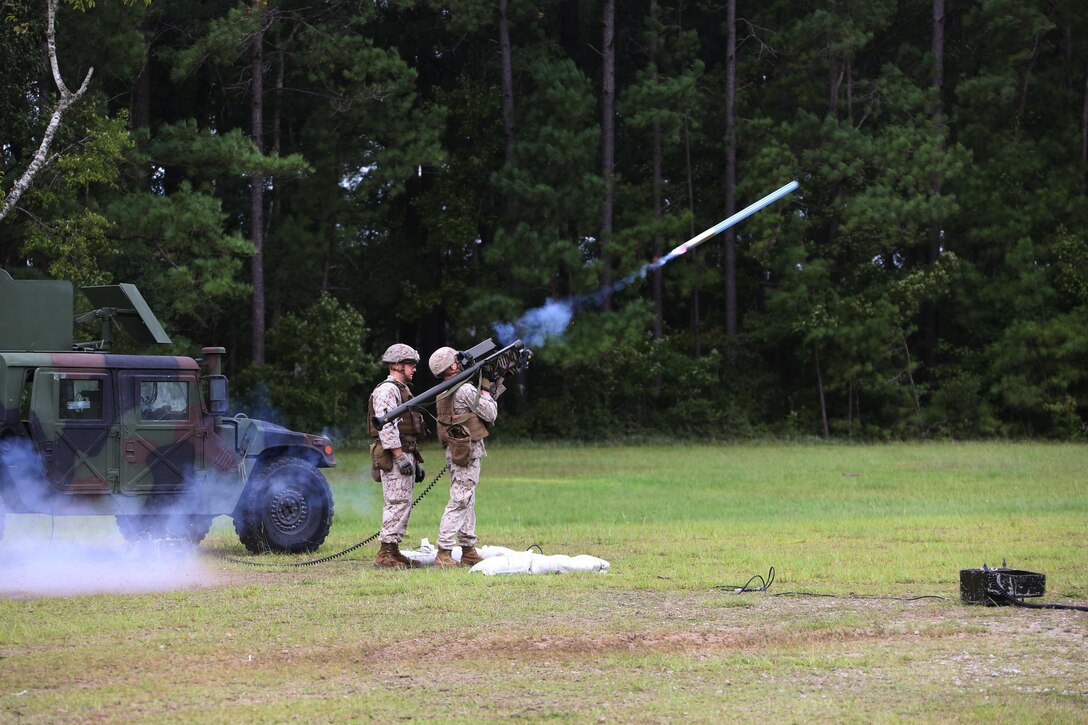 A Marine fires a dummy round into the air during a stinger simulation training range at Marine Corps Air Station Cherry Point, N.C., Sept. 24, 2015. Marines with 2nd Low Altitude Air Defense Battalion sharpened their proficiency skills by simulating the weight transfer felt when firing the 34.2 pound missile. The weapon is a personal and portable infrared, homing, surface-to-air missile capable of tracking and engaging aircraft up to an altitude of 10,000 feet and covering distances up to eight kilometers. 2nd LAAD utilizes the stinger missile to provide ground-to-air defense to the 2nd Marine Aircraft Wing and Marine Air-Ground Task Force elements.   