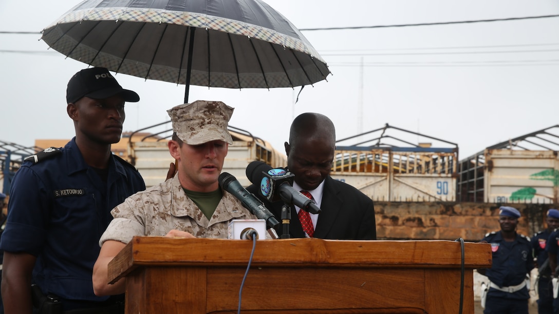 First Lt. Clifford A. Miles gives a speech during the National Surveillance Police graduation, Sept. 25, 2015 at the Benin National Police Academy in Cotonou, Benin. More than 150 National Surveillance Police students graduated from a monthlong U.S. Marine Corps training evolution that included weapons handling, combat marksmanship, patrolling, close-quarters combat, tactical site exploitation, tactical questioning and the operations order process.