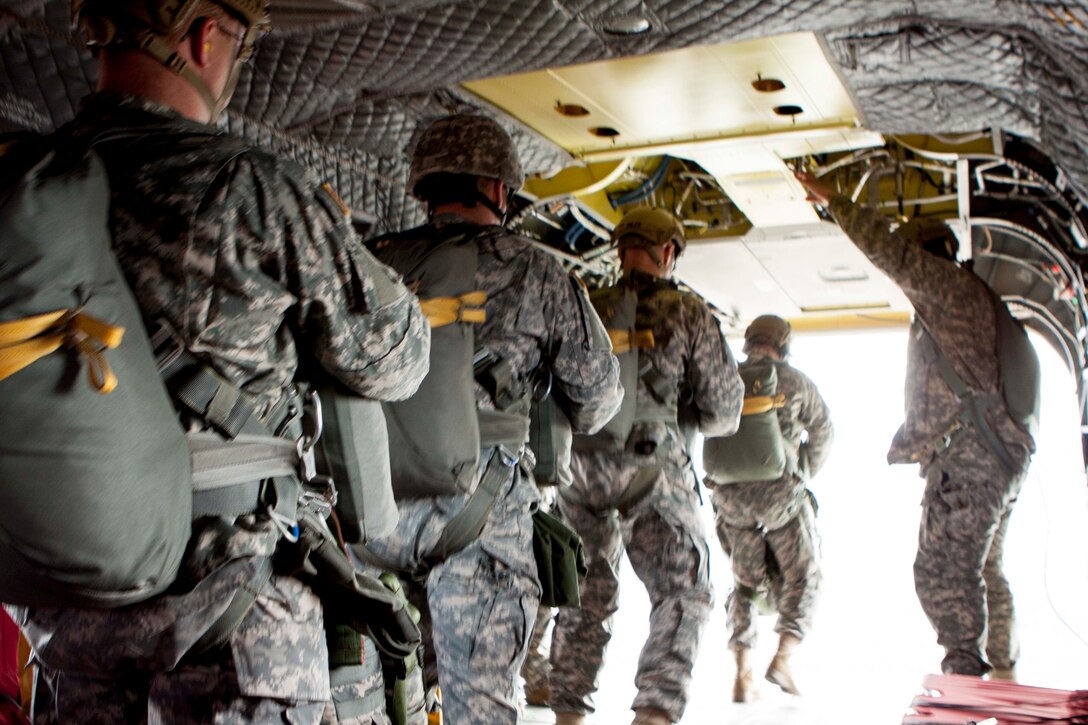 DLA Distribution Susquehanna’s airborne riggers perform a static line jump from a CH47 Chinook during a monthly airborne operation on April 14. 