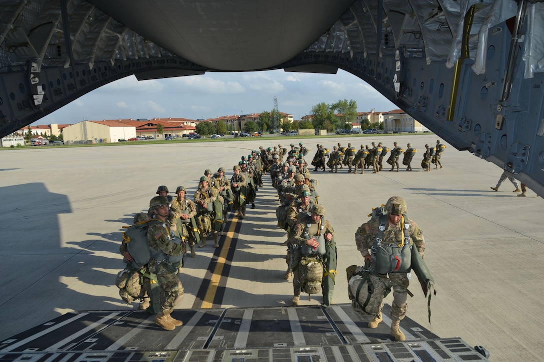 U.S. Army paratroopers and Hungarian Defense Forces paratroopers conduct sustained airborne training before an airborne operation into Hungary as part of Exercise Brave Warrior on Aviano Air Base, Italy, Sept. 16, 2015. The U.S. soldiers are with the 1st Battalion, 503rd Infantry Regiment, 173rd Airborne Brigade. U.S. Army photo by Graigg Faggionato