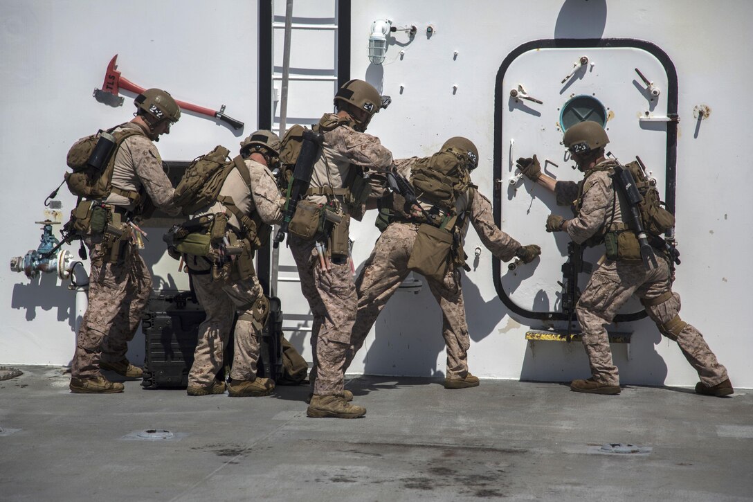 Marines conduct a visit, board, search and seizure aboard a simulated enemy vessel during an exercise off the coast of San Clemente Island, Calif., Sept. 23, 2015. U.S. Marine Corps photo by Sgt. Tyler C. Gregory