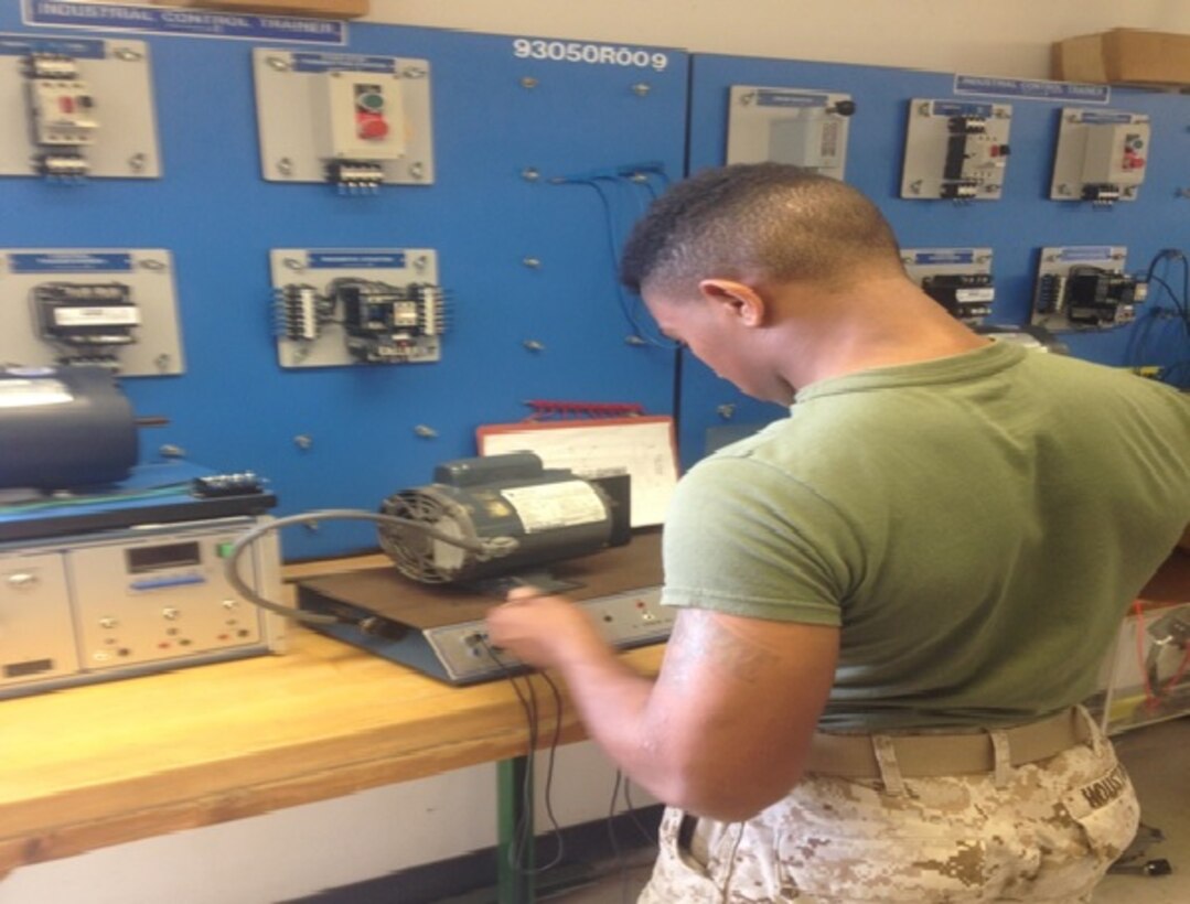 A Marine attached to Basic Engineer Equipment Electrical Specialist Technician  (BEEEST) 9-15 learns about electric motors and motor controllers.  In this class the Marines learn the fundamentals of 3 different types of motors and 3 motor controllers.  The Marines will wire up each motor and controller with the aid of an electrical schematic, the Marines also learn how the controllers work hand and hand with the motor as well as how each controller energizes and de-energizes the motor in different ways.
