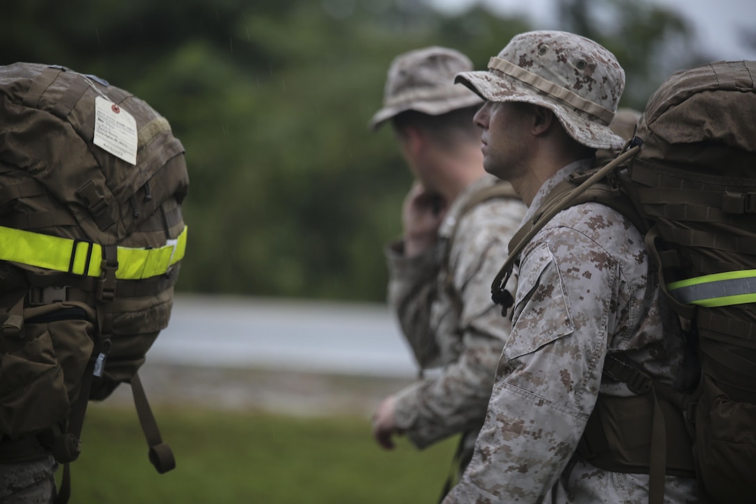 Marines with Combat Logistics Regiment 2, 2nd Marine Logistics Group, conduct a conditioning hike at Camp Lejeune, N.C., Sept. 25, 2015. The purpose of the hike was to build endurance and camaraderie within the unit. “We are a small unit, but we still work hard,” said Cpl. Barbara McCastle, a field radio operator. (U.S. Marine Corps photo by Cpl. Paul S. Martinez/Released)