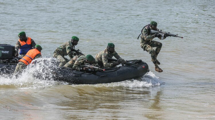 Compagnie Fusilier de Marin Commandos approach the beach during the final exercise with U.S. service members in Dakar, Senegal, Sept. 17, 2015. The Marines and Coast Guardsmen with Special-Purpose Marine Air-Ground Task Force Crisis Response-Africa spent four weeks training the COFUMACO on basic infantry tactics and small-boat operations as a part of a Maritime Security Force Assistance mission to increase interoperability with Senegal’s and strengthen the bond between the partner nations. 