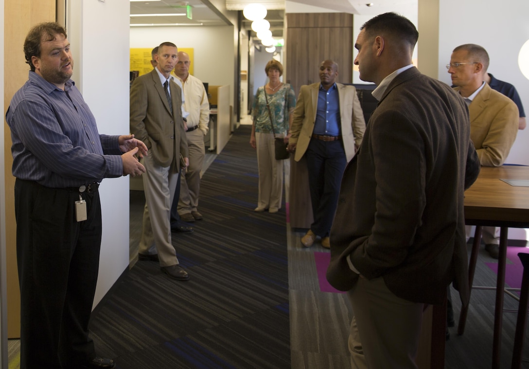 Sean P. Sheridan, field information technology manager with Microsoft, gives senior leaders of 4th Marine Logistics Group, Marine Forces Reserve, a tour of Microsoft’s San Francisco Sales Office, Sept. 26, 2015. Marines with 4th MLG gathered in San Francisco for the 4th MLG Senior Leadership Seminar to discuss leadership challenges within 4th MLG and to learn how civilian corporations apply leadership principles within their organizations. (U.S. Marine Corps photo by Cpl. Ian Leones/Released)