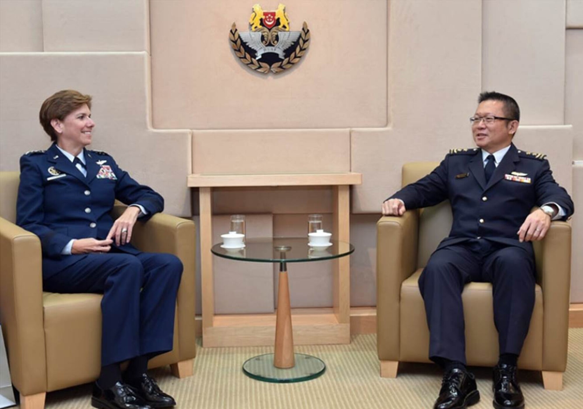 U.S. Air Force Gen. Lori J. Robinson, Pacific Air Forces commander, meets with Republic of Singapore air force Maj. Gen. Hoo Cher Mou, chief of air force, in Singapore, Sept. 28, 2015. The meeting was part of Robinson’s introductory visit to Singapore from Sept. 27-30, 2015, in which she will visit the Changi Command and Control Centre at Sembawang Air Base, Singapore, and speak to students at the Goh Keng Swee Command and Staff College. The visit highlights the partnership between the two countries, as well as enhancing the interoperability and professionalism between the two air forces. (Singapore Ministry of Defence photo/Released)