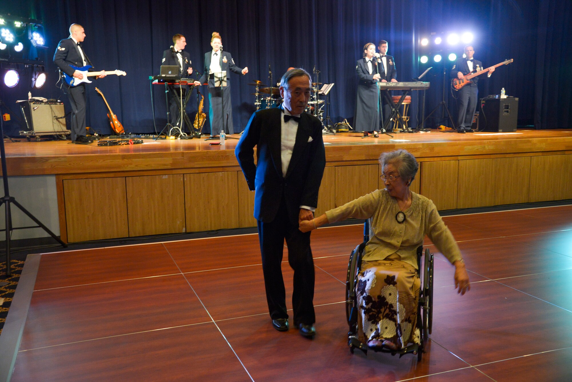 A Japanese couple dance during the Air Force ball at the Taiyo Community Center at Yokota Air Base, Japan, Sept. 25, 2015. This year's ball marked the 68th anniversary of the Air Force and commemorated its heritage. (U.S. Air Force photo by Senior Airman David Owsianka/Released)
