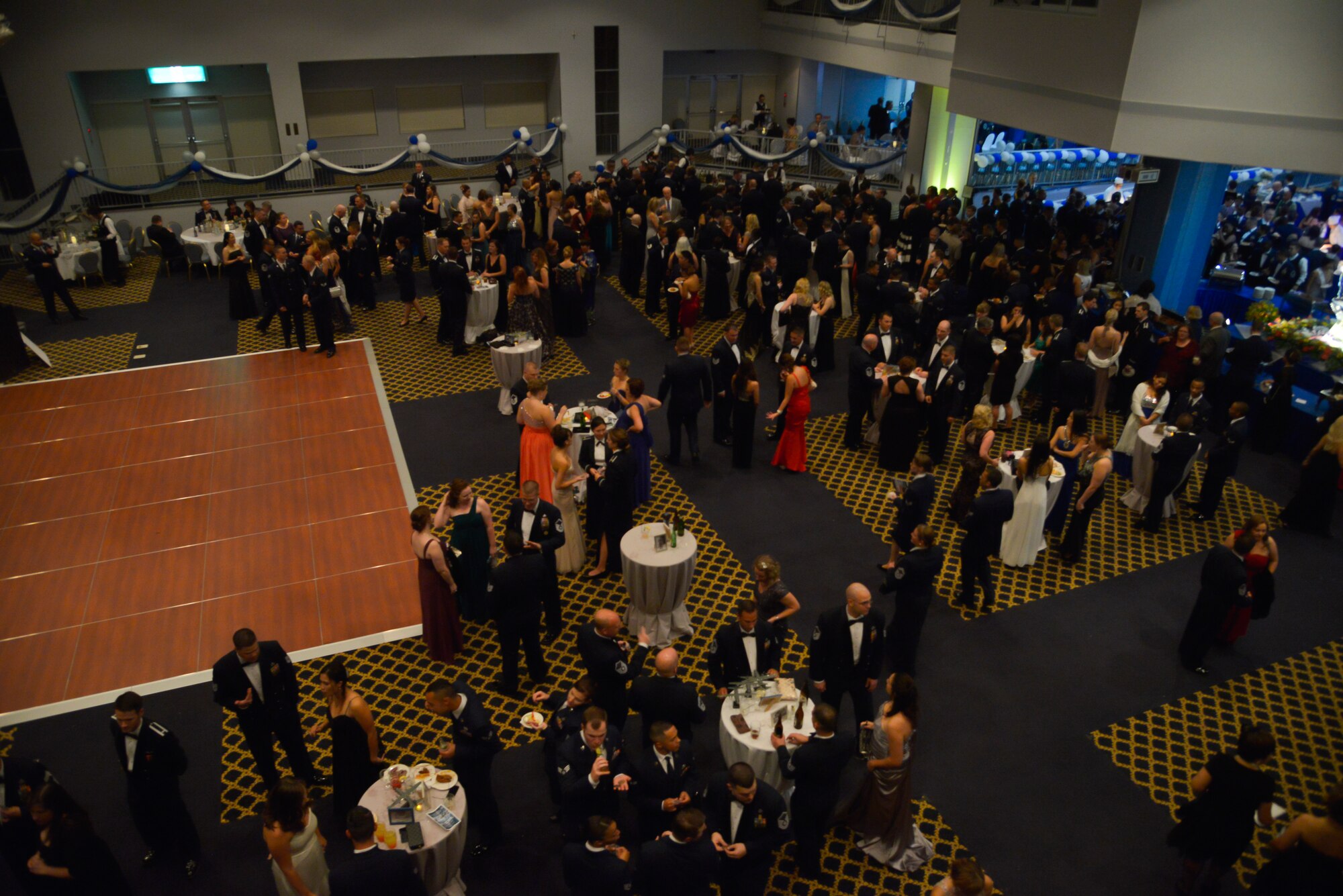 Members of Yokota Air Base attend the Air Force ball at the Taiyo Community Center, Sept. 25, 2015. The event featured a cake cutting ceremony, prizes and music performed by the Pacific Air Forces rock band. (U.S. Air Force photo by Senior Airman David Owsianka/Released)