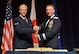 Airman Spencer Patton, 374th Civil Engineer Squadron emergency management apprentice, Lt. Gen. John Dolan, U.S. Forces Japan and 5th Air Force commander, cut the cake as part of the opening ceremony of the Air Force ball at Yokota Air Base, Japan, Sept. 25, 2015. As part of the ball’s opening ceremony, it’s tradition for the most senior and junior Airmen to cut the cake. (U.S. Air Force photo by Senior Airman David Owsianka/Released)
