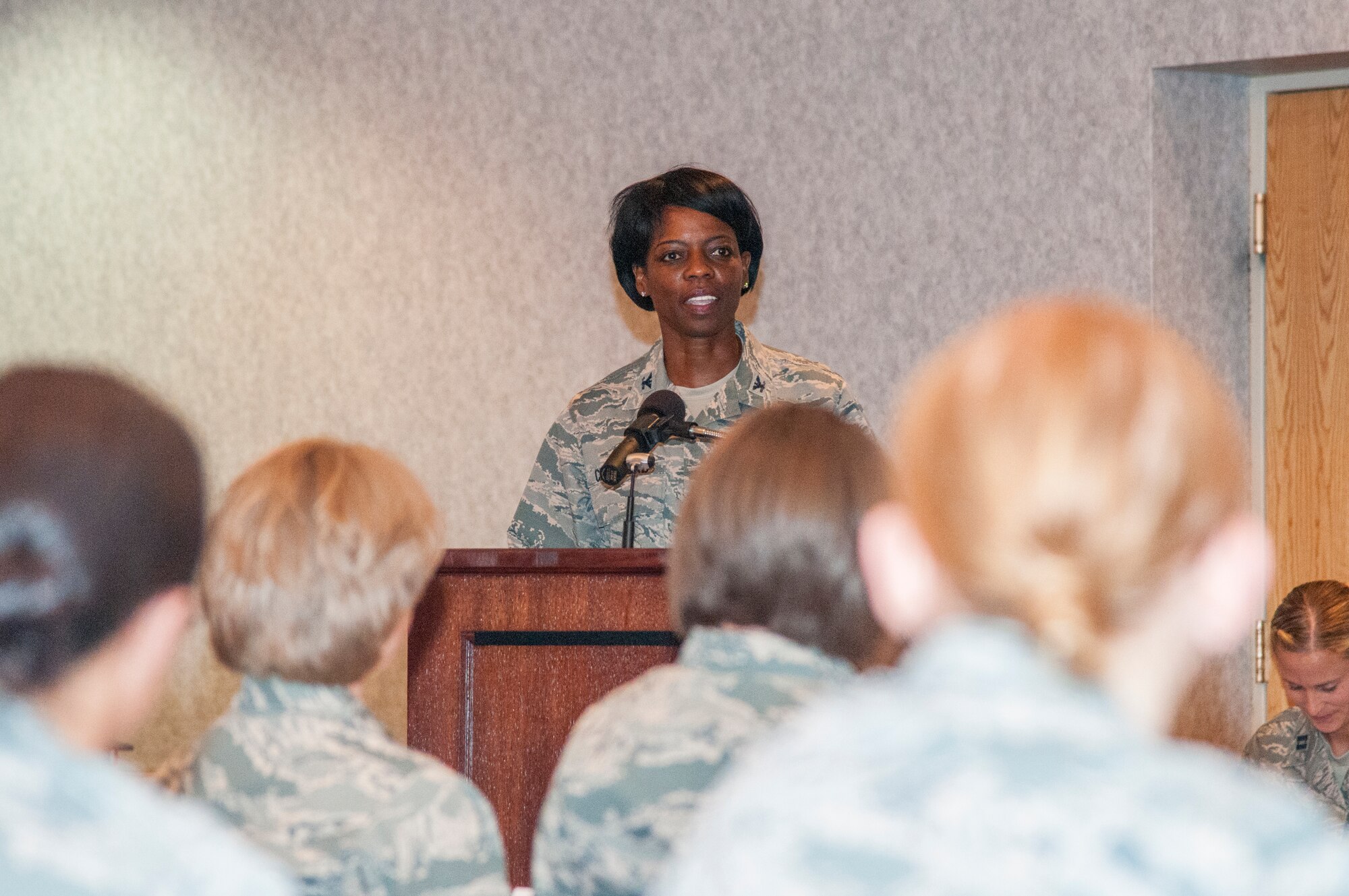 Col. Gail Crawford, Air Force Nuclear Weapons Center staff judge advocate, speaks to Airmen attending the 20th Air Force Women’s Leadership Symposium in the F.E. Warren Air Force Base, Wyo., Trail’s End Event Center Sept. 16, 2015. Crawford was among a group of female leaders who mentored female Airmen during the symposium to help them improve their leadership skills. (U.S. Air Force photo by Senior Airman Jason Wiese)
