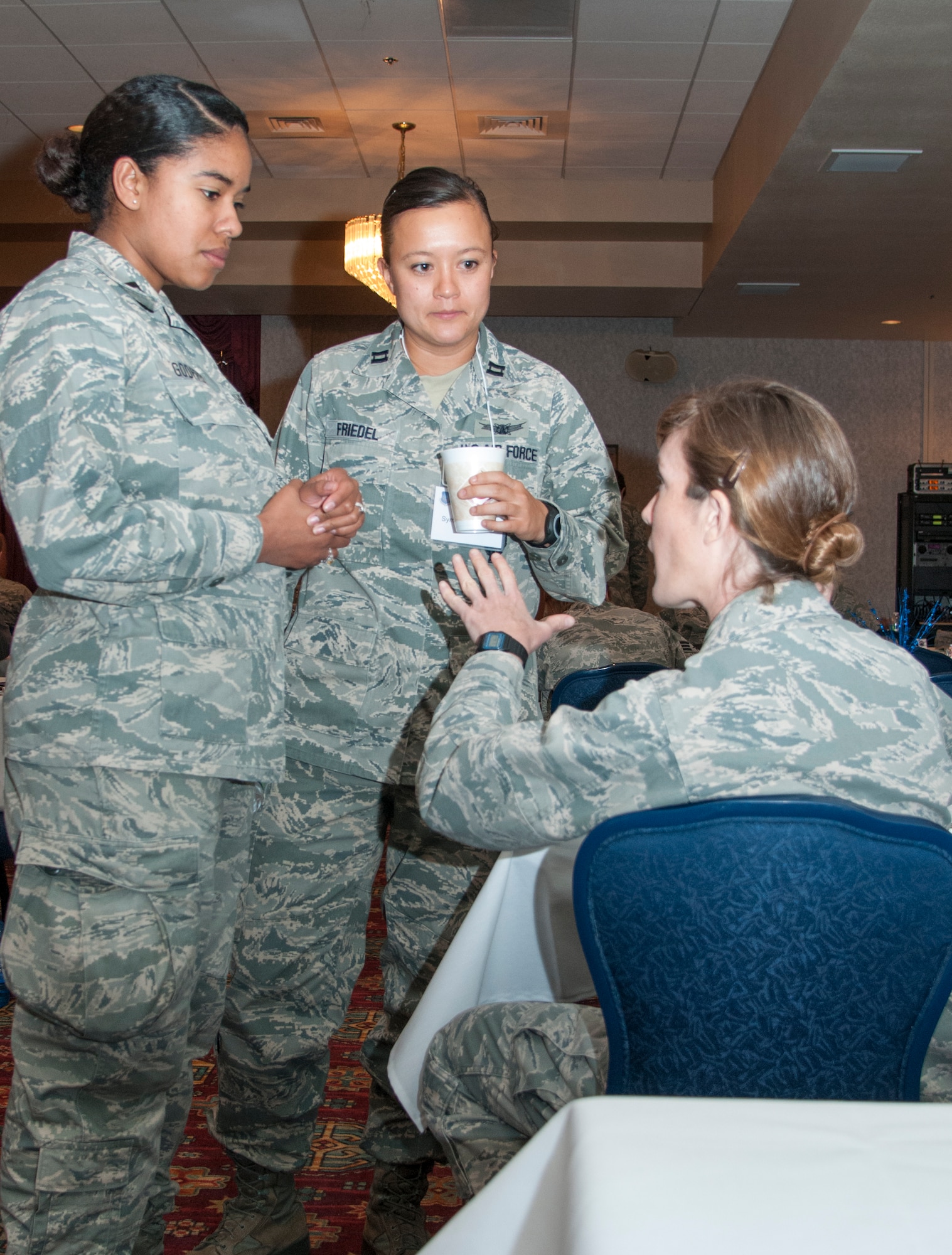 Twentieth Air Force Women’s Leadership Symposium attendees converse during a break in scheduled activities Sept. 15, 2015, in the F.E. Warren Air Force Base, Wyo., Trail’s End Event Center. The event connected women throughout the 20th AF for mentorship and professional development. (U.S. Air Force photo by Senior Airman Jason Wiese)