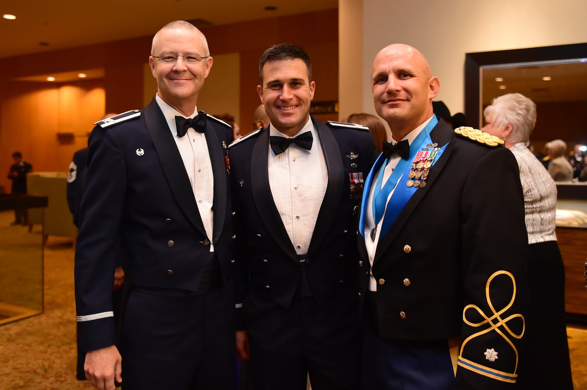 From left, Col. Michael Kindt, 460th Space Wing Medical Group commander, Col. John Wagner, 460th Space Wing commander and Lt. Col. Andrew Pekala, 743rd Military Intelligence Battalion commander, stand together during the Air Force ball Sept. 25, 2015, at the Westin Hotel in Denver. Team Buckley held an annual ball to celebrate the 68th birthday of the Air Force. (U.S. Air Force photo by Airman 1st Class Luke W. Nowakowski/Released)