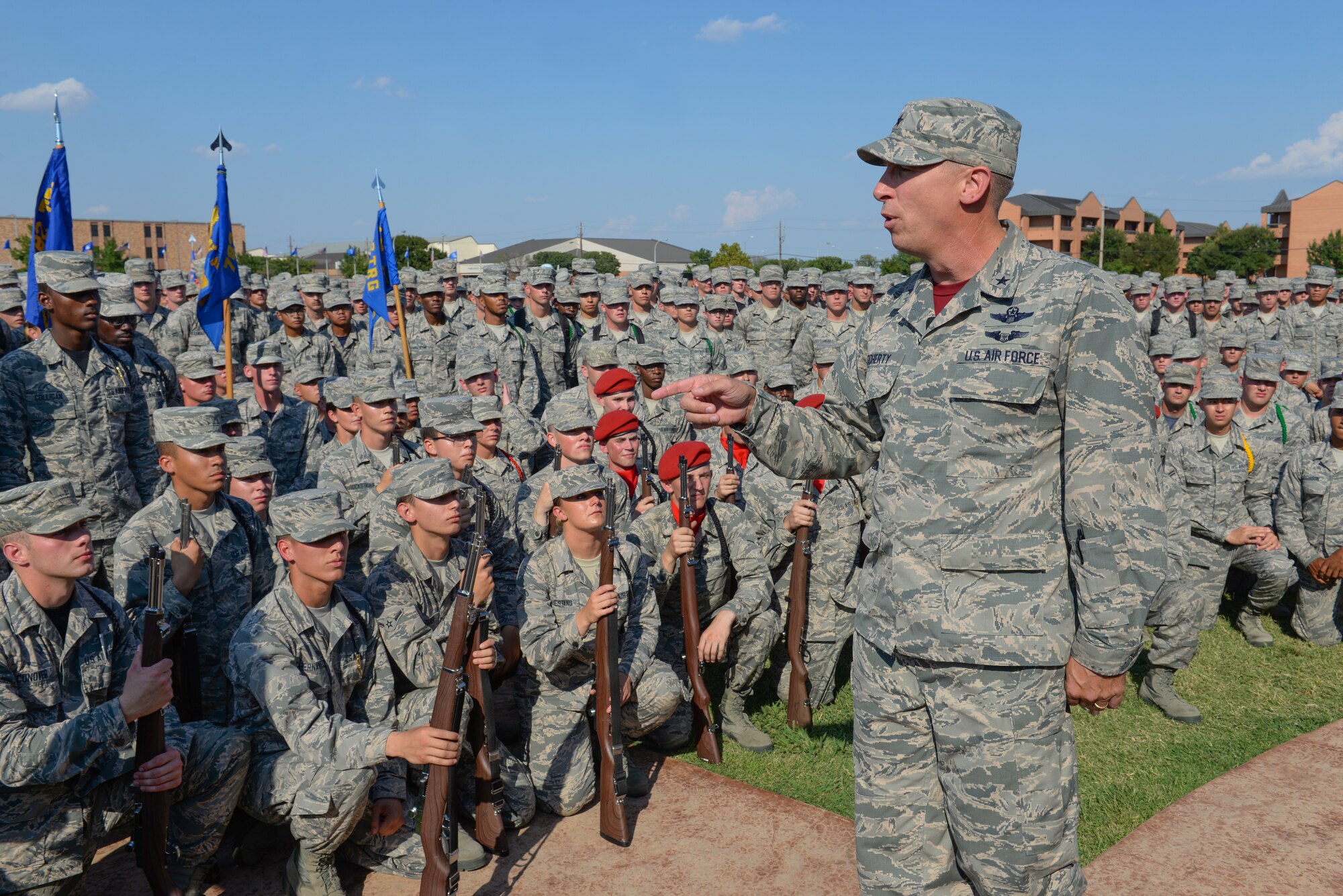 Brig. Gen. Patrick Doherty, 82nd Training Wing commander, speaks to technical training students at Sheppard Air Force Base, Texas, about the importance of their training and the impact they will have for the future's Air Force, Sept. 25, 2015. Doherty provided his closing remarks after a drill competition at the base parade grounds. Drill competitions, such as this one, promote friendly rivalry and morale among the Airmen in Training. (U.S. Air Force photo/Senior Airman Kyle Gese)