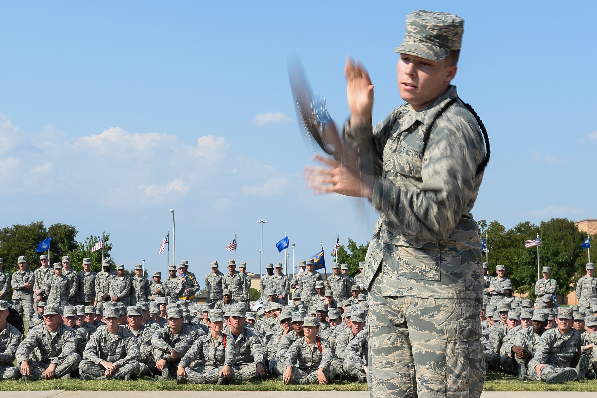 A technical training student at Sheppard Air Force Base, Texas, competes in a drill competition at the base parade grounds, Sept. 25, 2015. Drill competitions, such as this one, promote friendly rivalry and morale among the Airmen in Training. (U.S. Air Force photo/Senior Airman Kyle Gese)
