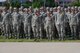 Technical training students at Sheppard Air Force Base, Texas, shout their squadron chants before participating in a drill competition at the parade grounds, Sept. 25, 2015. Drill competitions, such as this one, promote friendly rivalry and morale among the Airmen in Training. (U.S. Air Force photo/Senior Airman Kyle Gese)