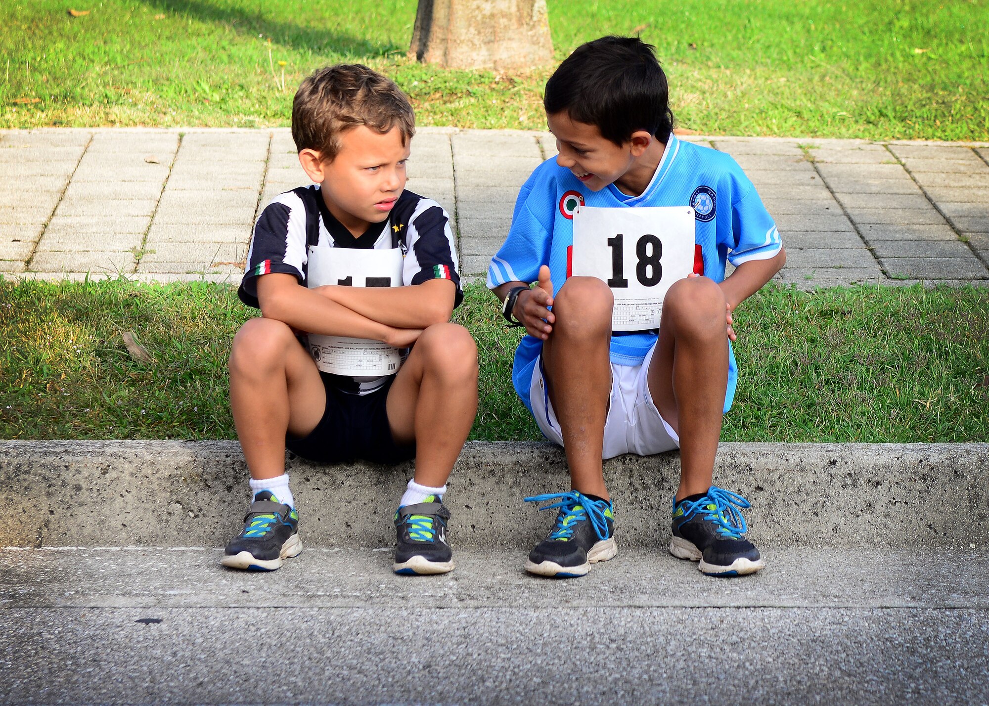 Chase and Riley McCormick, prepare for the family 5k run/walk during Team Aviano’s 9th annual Aviano Half Marathon, Sept. 9, 2015. Runners also participated in a 10k Run and a children’s one-mile fun run. (U.S. Air Force photo by Senior Airman Areca T. Bell/Released)