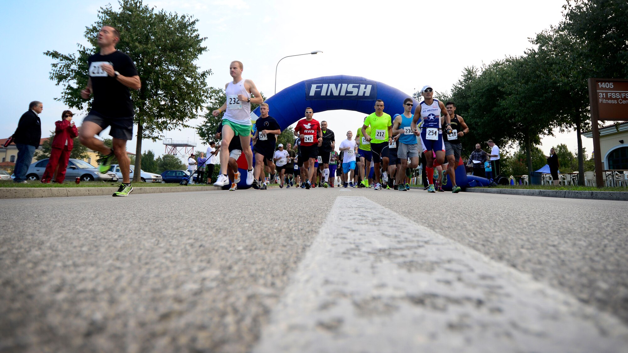 Participants run during Team Aviano’s 9th annual Aviano Half Marathon, Sept. 9, 2015. In addition to the 13.1 mile race, runners also participated in a 10k Run, family 5k run/walk and a children’s one-mile fun run. (U.S. Air Force photo by Senior Airman Areca T. Bell/Released)