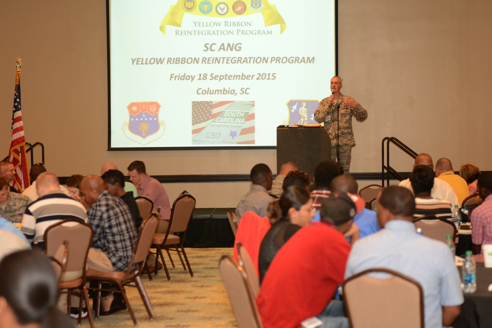 U.S. Air Force Lt. Col. Brian Bohlman, 169th Fighter Wing chaplain at McEntire Joint National Guard Base, S.C., speaks to South Carolina Air National Guardsmen at the Medallion Center in Columbia, S.C., during the Yellow Ribbon Reintegration Program seminar, Sept. 18, 2015.  The Y.R.R.P. provides resources for SCANG members and their families during deployment cycles.  (U.S. Air National Guard photo by Airman 1st Class Ashleigh Pavelek/RELEASED)