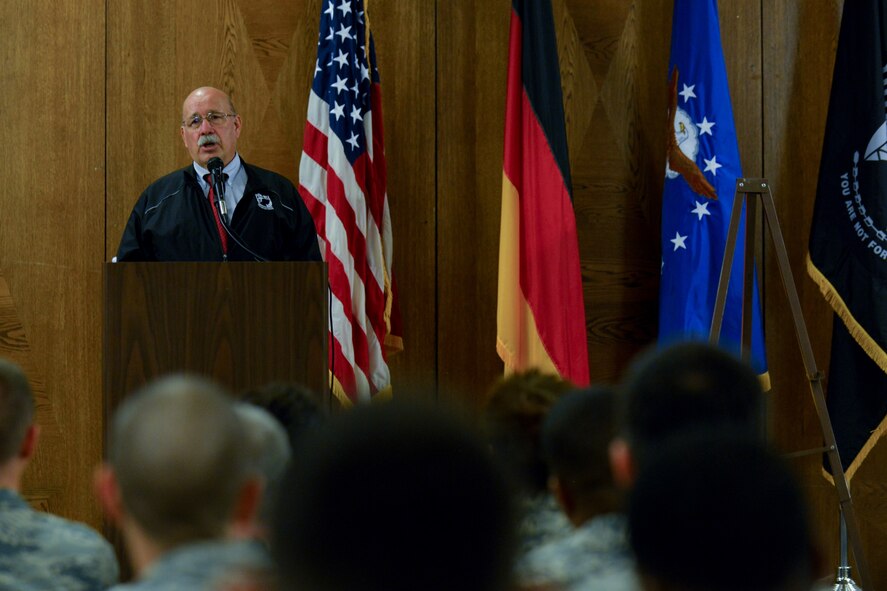 Retired U.S. Air Force Col. Joseph Milligan speaks during a POW/MIA remembrance luncheon Sept. 16, 2015, at Ramstein Air Base, Germany. Milligan talked to Airmen about his experiences as a prisoner of war and the experiences of those he served alongside.  (U.S. Air Force photo/Senior Airman Nicole Sikorski)