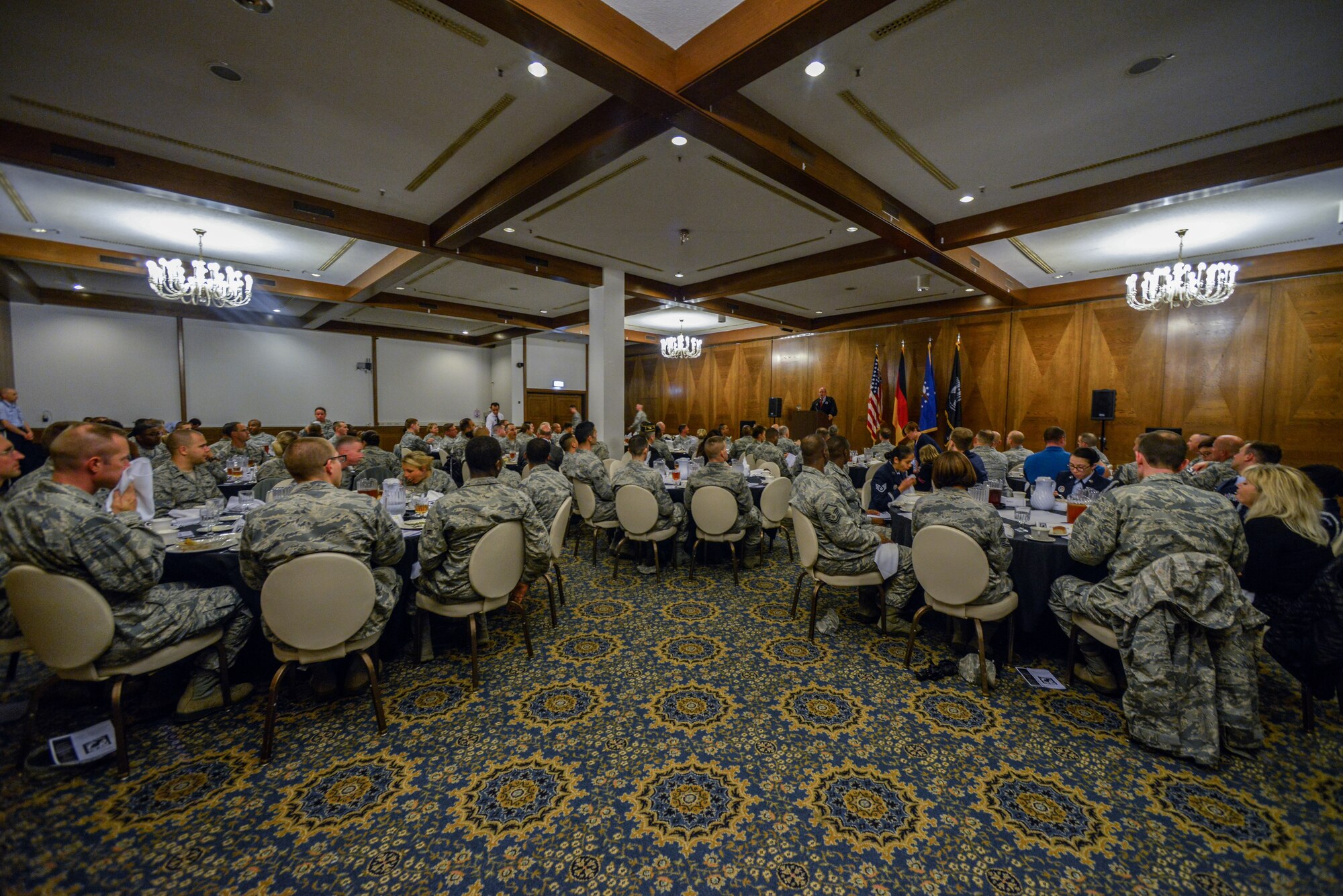 Retired U.S. Air Force Col. Joseph Milligan speaks during a POW/MIA remembrance luncheon Sept. 16, 2015, at Ramstein Air Base, Germany. Milligan and his family visited Ramstein to speak about his experiences as a prisoner of wat and participate in a run and wreath-laying ceremony for those who have made a similar sacrifice as his.  (U.S. Air Force photo/Senior Airman Nicole Sikorski)