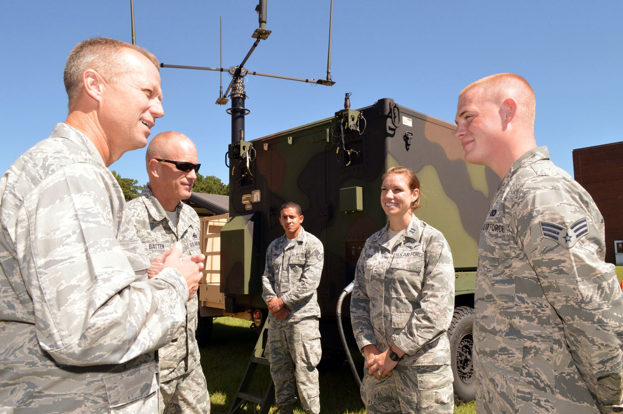 U.S. Air Force Maj. Gen. Mark Kelly, 9th Air Force commander, receives a mission briefing from Senior Airman Jonathon Moore, a power production specialist assigned to the 682nd Air Support Operations Squadron, on how he provides power production for an air support operations center. Kelly visited 18th Air Support Operations Group battlefield Airmen at Pope Army Airfield, North Carolina, Sept. 14, 2015. Command Chief Master Sgt. Frank Batten III, 9th Air Force command chief, Staff Sgt. Shaun Simmons and Capt. Abby Klier, 682nd Air Support Operations Squadron, look on. (U.S. Air Force photo/Marvin Krause)