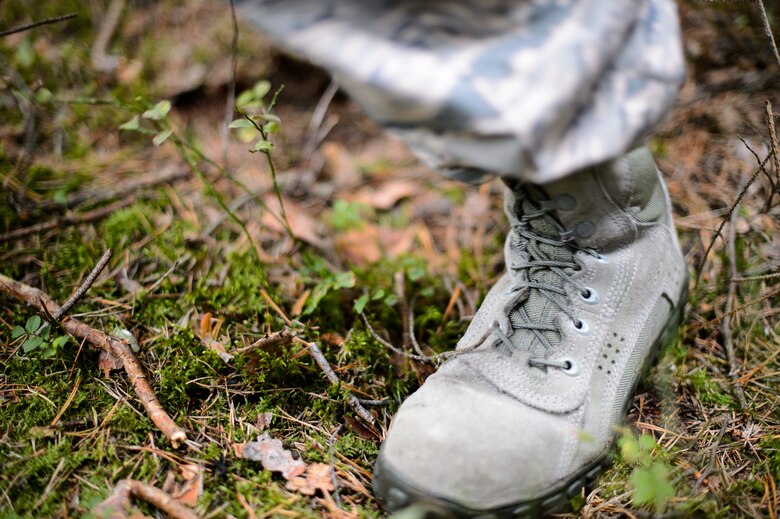 Master Sgt. Steven Hollatz, 7th Weather Squadron logistics and resources NCO in charge, takes off in search of a fixed point at the Grafenwohr Training Area, Germany, Sept. 16, 2015. Airmen from the 7th WS received land navigation training during Cadre Focus. Instructors revamped Cadre Focus with an emphasis on improving basic Army and forecasting skills for deployments in Eastern Europe. (U.S. Air Force photo/Staff Sgt. Armando A. Schwier-Morales)