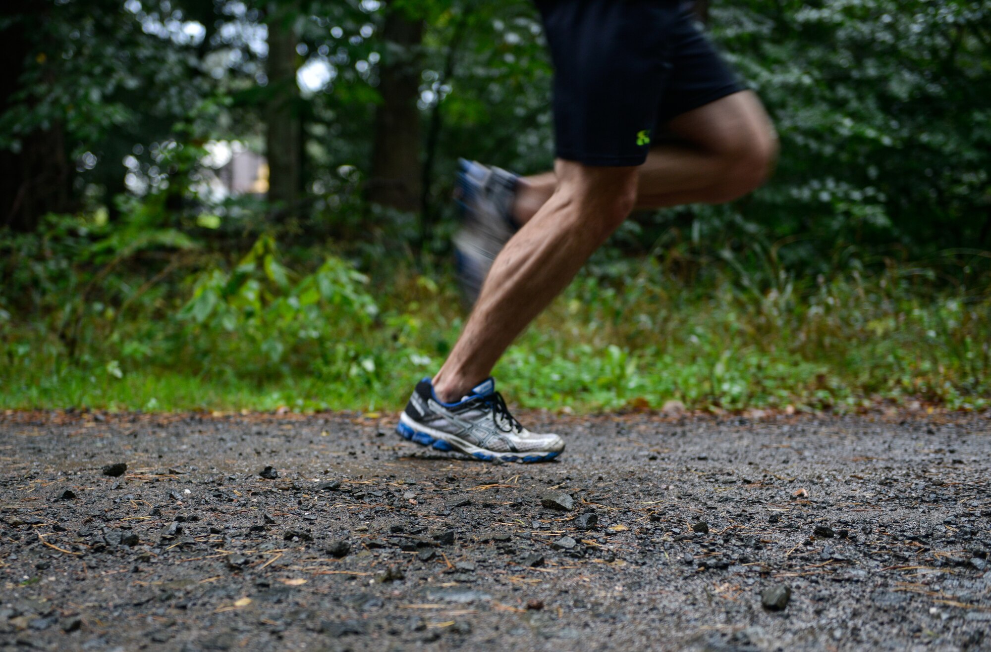 A runner’s foot strikes the ground as he sprints toward the finish line during a POW/MIA remembrance run Sept. 16, 2015, at Ramstein Air Base, Germany.  The annual 5K run was held by the 435th Air Ground Operations Wing and 435th Air Expeditionary Wing to celebrate the service of those who were and still are POW/MIA. (U.S. Air Force photo/Senior Airman Nicole Sikorski)