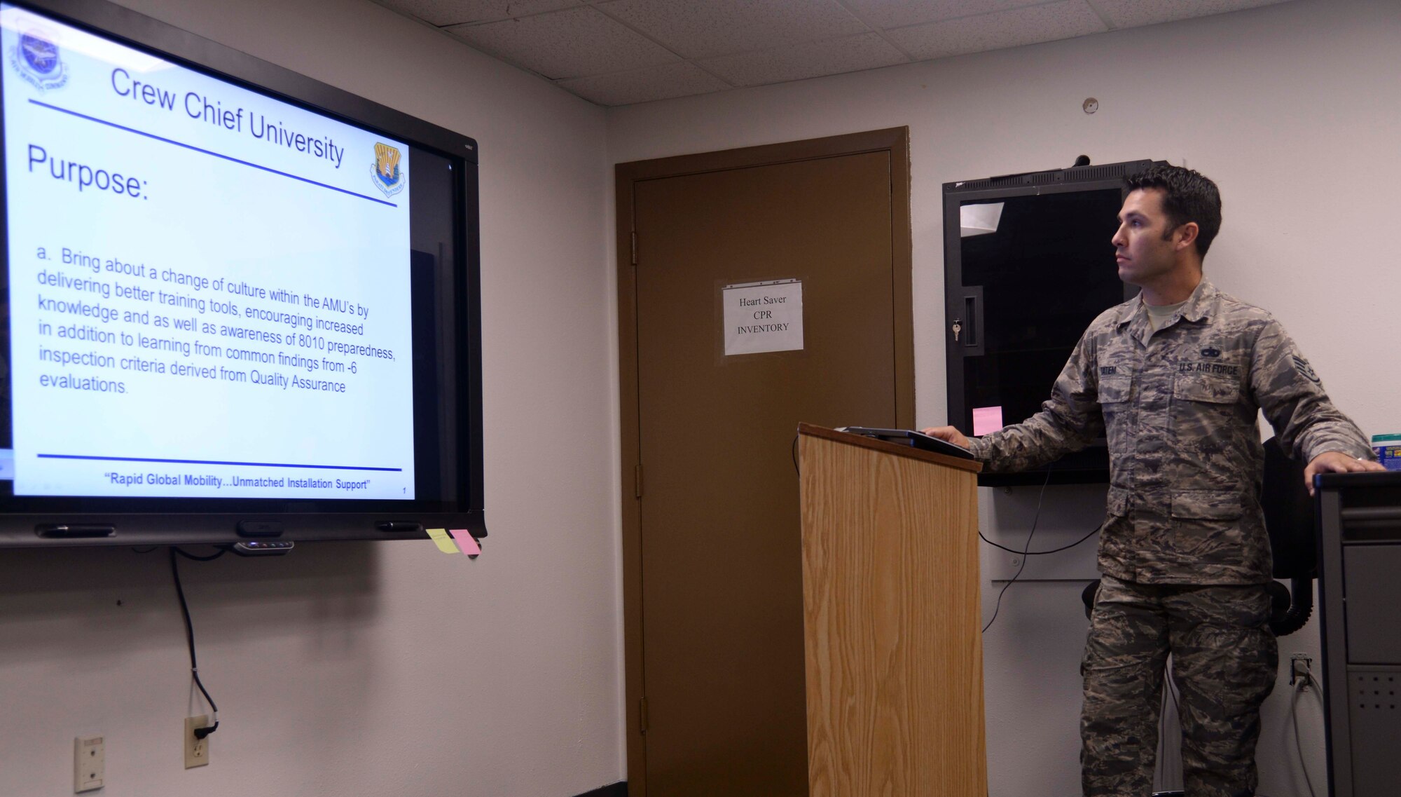 Staff Sgt. Dustin Tatem, 6th Maintenance Group training instructor, leads a Crew Chief University course at MacDill Air Force Base, Fla., Sept. 28, 2015. The course material clarifies and emphasizes the importance of the 8010 mission while also focusing on what crew chiefs can do to further the mission by continuing to expand their knowledge of the aircraft. (U.S. Air Force photo by Senior Airman Vernon L. Fowler Jr./Released)