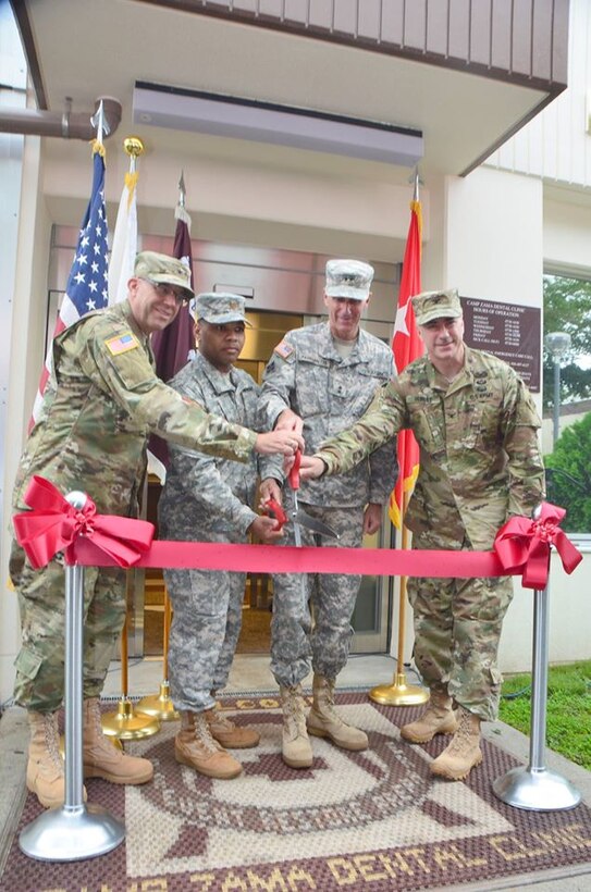 From left to right: Col. John Etzenbach, commander of the Pacific Regional Dental Command; Maj. Demarcio Reed, commander of the U.S. Army Dental Activity Japan; Maj. Gen. James F. Pasquarette, commander U.S. Army Japan/I Corps Forward; and Col. John Hurley, commander of the U.S. Army Corps of Engineers, Japan District celebrate the completion of the U.S. Army Dental Activity Japan Clinic on Camp Zama during a ribbon cutting ceremony Sept. 2. The state-of-the-art clinic provides routine basic oral care, orthodontics, and limited specialty care to Soldiers, civilians, and their families in the U.S. Army Japan community. The U.S. Army Corps of Engineers, Japan District provided contract award, contract administration and quality assurance support for the design and construction of the $24 million multi-phase renovation project. Renovations include structural foundation improvements, heating, ventilation, and air conditioning systems, fire protection and upgrades to all interior lighting and communications systems. (USACE photos by Rashida Banks)
