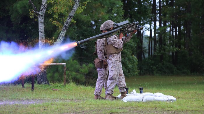 A Marine fires an FIM-92 Stinger Missile at a target during a stinger simulation training range at Marine Corps Air Station Cherry Point, North Carolina, Sept. 24, 2015. Marines with 2nd Low Altitude Air Defense Battalion sharpened their proficiency skills by simulating the weight transfer felt when firing the 34.2 pound missile. The weapon is a personal and portable infrared, homing, surface-to-air missile capable of tracking and engaging aircraft up to an altitude of 10,000 feet and covering distances up to eight kilometers. 2nd LAAD utilizes the stinger missile to provide ground-to-air defense to the 2nd Marine Aircraft Wing and Marine Air-Ground Task Force elements.