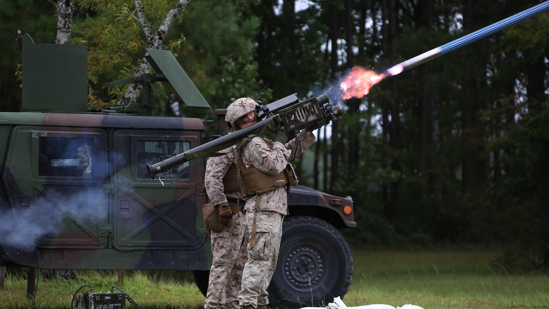 A Marine fires an FIM-92 Stinger Missile at a target during a stinger simulation training range at Marine Corps Air Station Cherry Point, North Carolina, Sept. 24, 2015. Marines with 2nd Low Altitude Air Defense Battalion sharpened their proficiency skills by simulating the weight transfer felt when firing the 34.2 pound missile. The weapon is a personal and portable infrared, homing, surface-to-air missile capable of tracking and engaging aircraft up to an altitude of 10,000 feet and covering distances up to eight kilometers. 2nd LAAD utilizes the stinger missile to provide ground-to-air defense to the 2nd Marine Aircraft Wing and Marine Air-Ground Task Force elements.