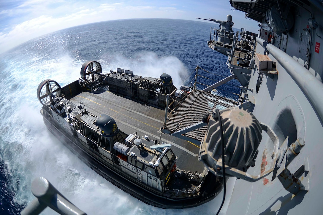 A landing craft air cushion approaches the well deck of the amphibious assault ship USS Boxer during operations in the Pacific Ocean, Sept. 28, 2015. The Boxer is off the coast of Southern California conducting routine training exercises and maintenance to prepare for its upcoming deployment. U.S. Navy photo by Petty Officer 3rd Class Jesse Monford
