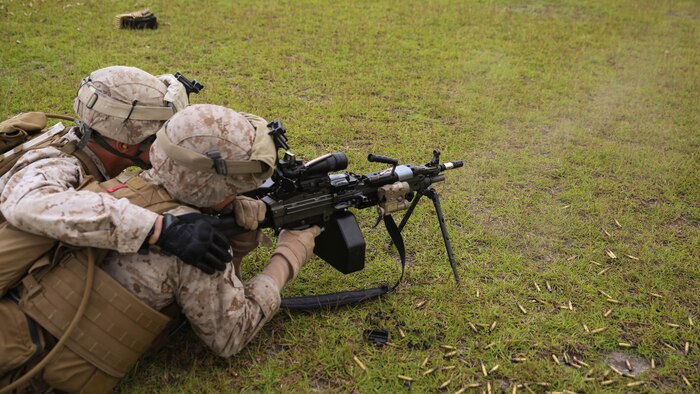 Marines with 1st Battalion, 6th Marine Regiment use the M249 light machine gun to shoot at practice targets during live fire training aboard Camp Lejeune, N.C., Sept. 22 – 23, 2015. The training aimed to improve the Marines’ proficiency with multiple weapons systems and to prepare the Marines for a security element course. 