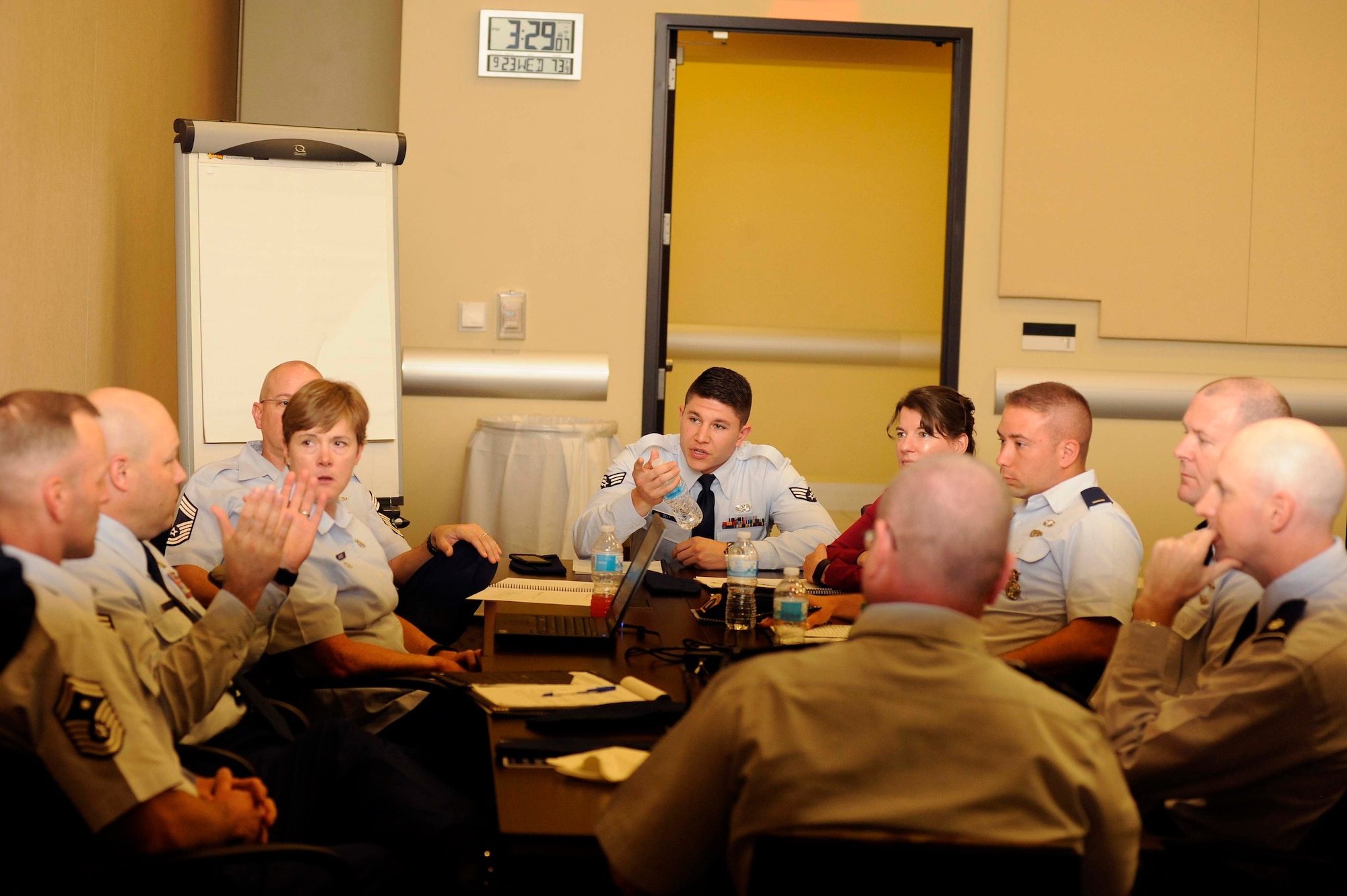 One group discusses a strategy on how to minimize suicides among Airmen during the Suicide Prevention Summit at Joint Base Andrews, Md., Sept. 24, 2015. After the three-day training, each group presented their ideas to the chief of staff and vice chief of staff of the Air Force. (Air Force photo/Staff Sgt. Whitney Stanfield)  