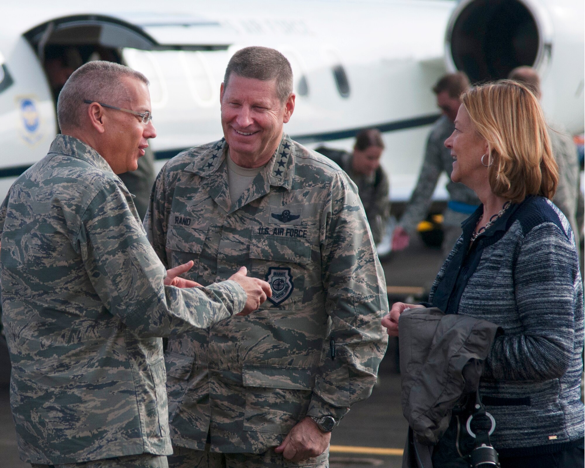 Maj. Gen. Jack Weinstein, 20th Air Force and Task Force 214 commander, greets AFGSC commander Gen. Robin Rand and his wife Kim after they arrived in Cheyenne, Wyo., Sept. 22, 2015. Gen. Rand and his wife visited F.E. Warren Air Force Base as part of an immersion tour to meet with Airmen who perform the ICBM mission. (U.S. Air Force photo by Senior Airman Jason Wiese)