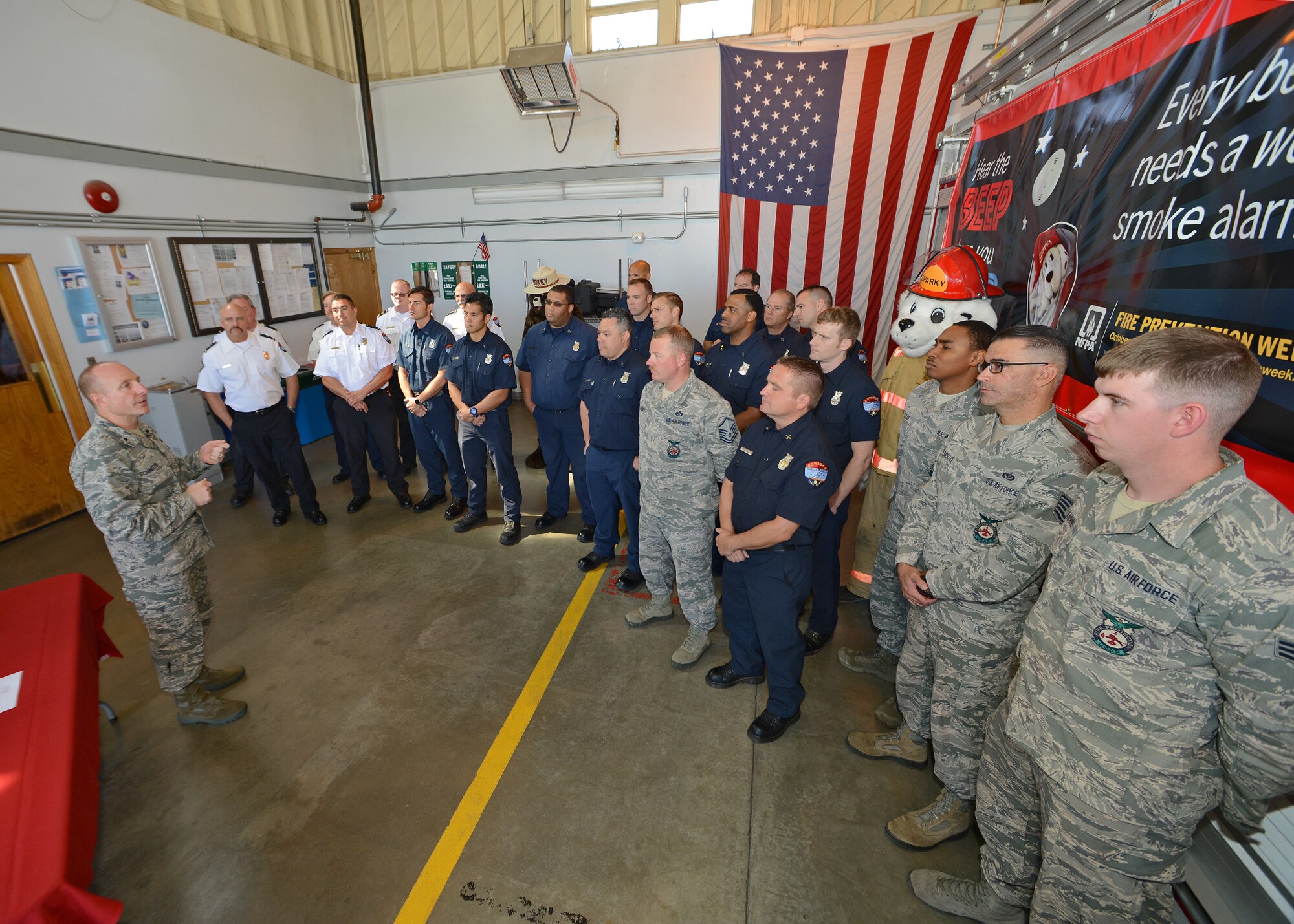 Brig. Gen. Carl Schaefer, 412th Test Wing commander, speaks to members of the Edwards AFB Fire Department Sept. 18. Schaefer signed this year's Fire Prevention Week Proclamation. Fire Prevention Week runs from Oct. 4 - 10. (U.S. Air Force photo by Jet Fabara)