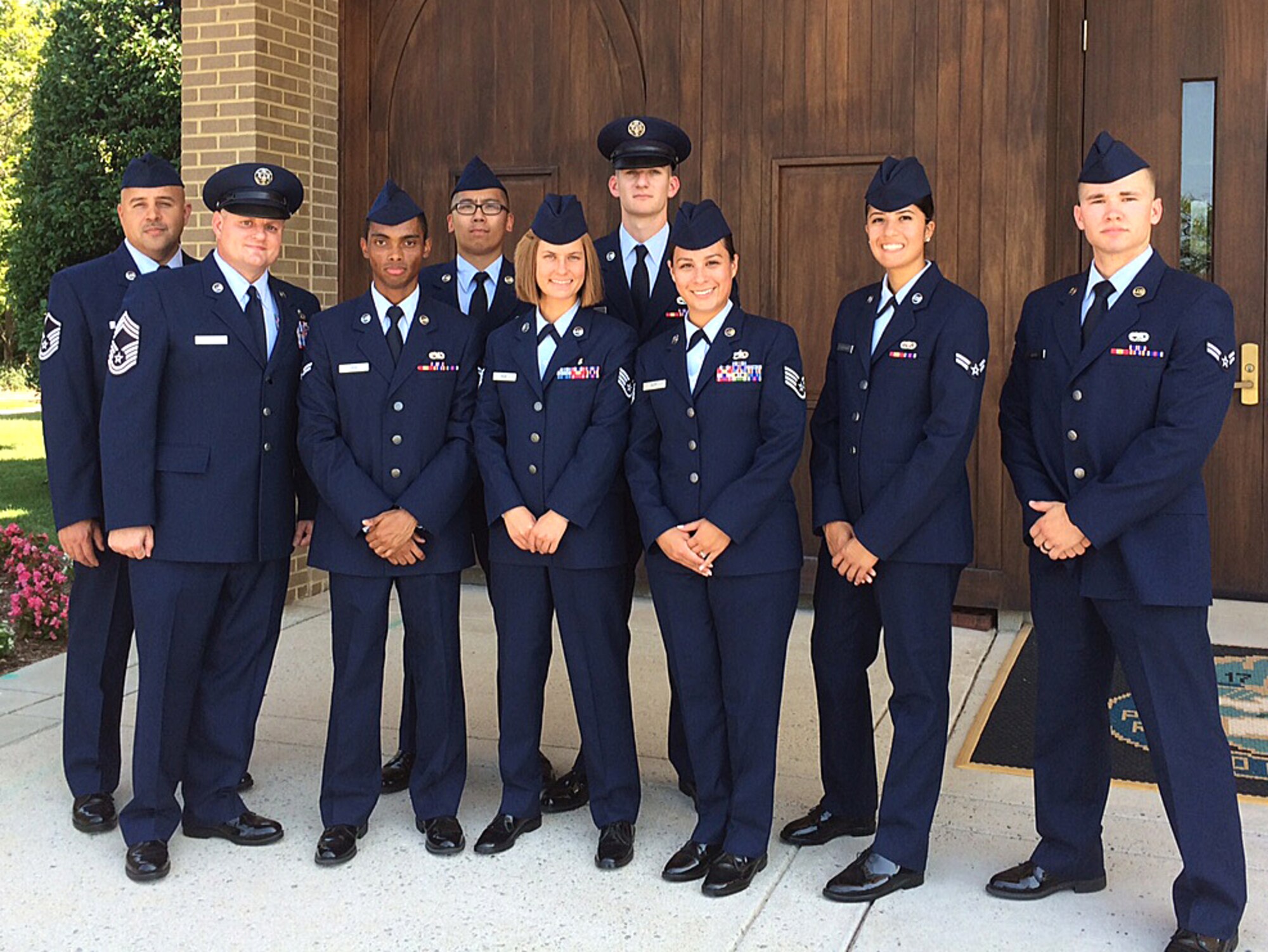 Team Dover members pose for a photo Aug. 14, 2015, at the Fort Meyers post chapel, Arlington, Va. The nine Team Dover members attended a memorial service and interment at Arlington National Cemetery, Va., for the ninth Chief Master Sgt. of the Air Force James C. Binnicker, who passed away on March 21, 2015 (Courtesy photo)