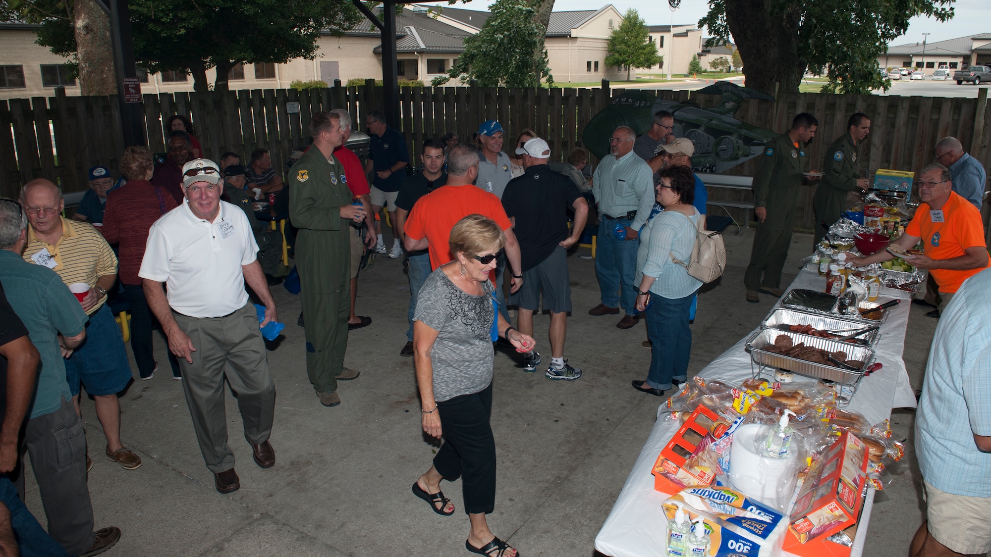 Current and former members of the 9th Airlift Squadron attending the 9th AS’s 75th Anniversary Block Party Cookout Sept. 25, 2015, at Dover Air Force Base, Del. Current Pelicans, alumni and their families attended the reunion cookout that included face-painting, a bouncy castle and corn hole. (U.S. Air Force photo/Senior Airman Zachary Cacicia)