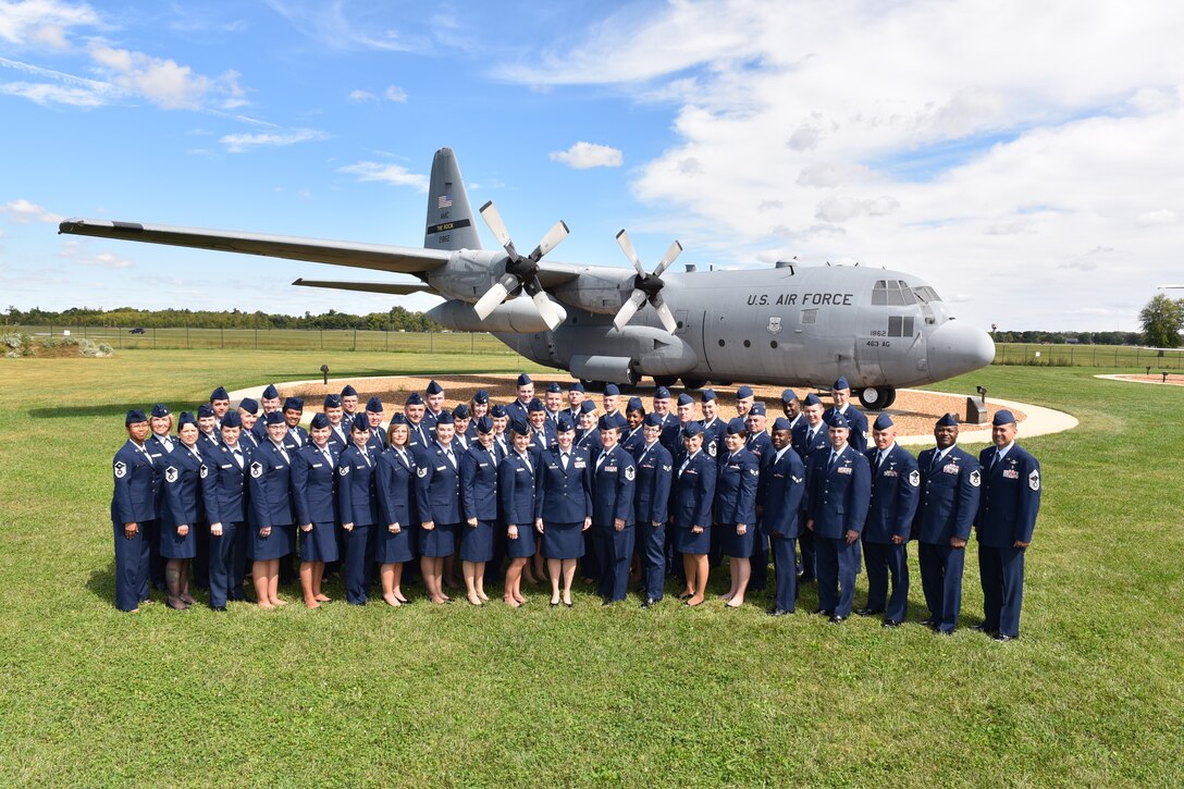 932nd Aeromedical Evacuation Squadron members gathered recently to get their squadron documented in photography before one of the main aircraft that they fly on.  Strong cooperation between AES and the 932nd Aeromedical Staging Squadron is always evident when patients are visiting or transiting Scott Air Force base upon the visiting C-130. (U.S. Air Force photo/Tech. Sgt. Christopher Parr)