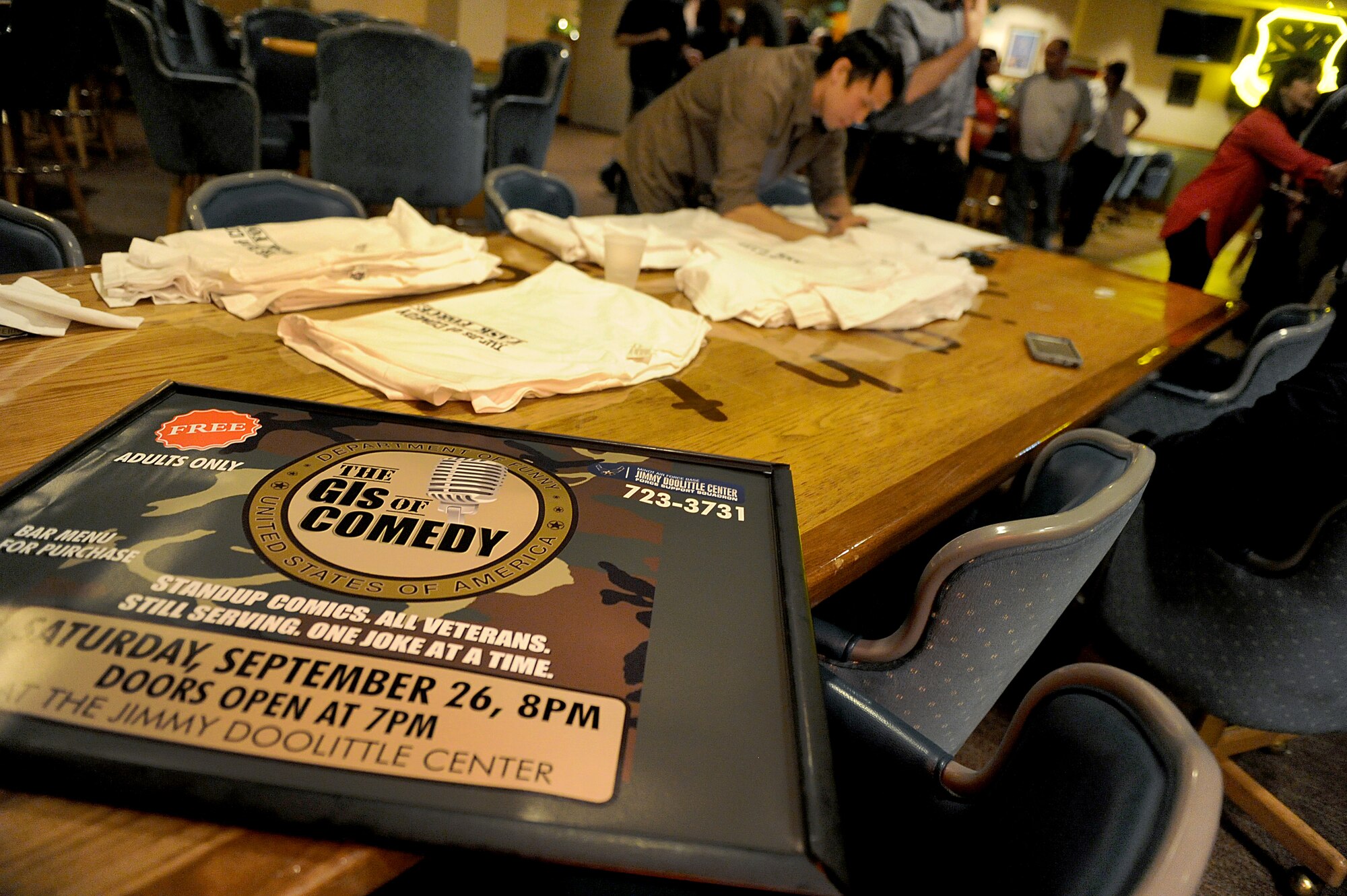 GIs of Comedy sign at the Jimmy Doolittle Center at Minot Air Force Base, N.D. Sept. 26, 2015. GIs of Comedy travel to different bases and locations all over the world to perform for troops. (U.S. Air Force photo by Staff Sgt. Chad Trujillo) 