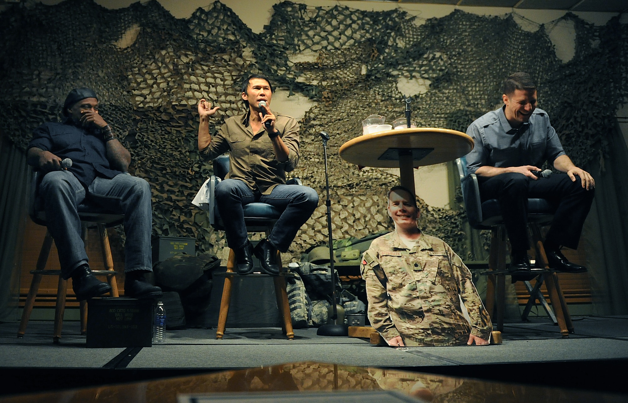 Eljaye Montenegro, Thom Tran and Jose Sarduy perform at the Jimmy Doolittle Center at Minot Air Force Base, N.D. Sept. 26, 2015. All three comics are part of the GIs of Comedy who travel to different bases and locations all over the world to perform for troops. (U.S. Air Force photo by Staff Sgt. Chad Trujillo) 

