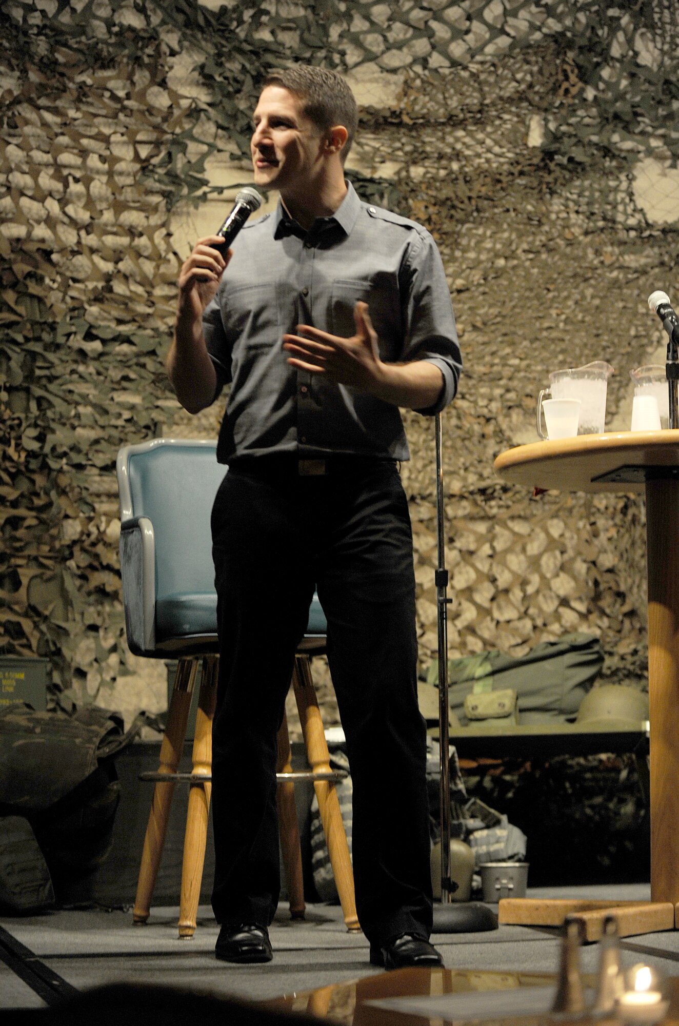 Jose Sarduy performs at the Jimmy Doolittle Center at Minot Air Force Base, N.D. Sept. 26, 2015. Sarduy is part of the GIs of Comedy who travel to different bases and locations all over the world to perform for troops. (U.S. Air Force photo by Staff Sgt. Chad Trujillo) 