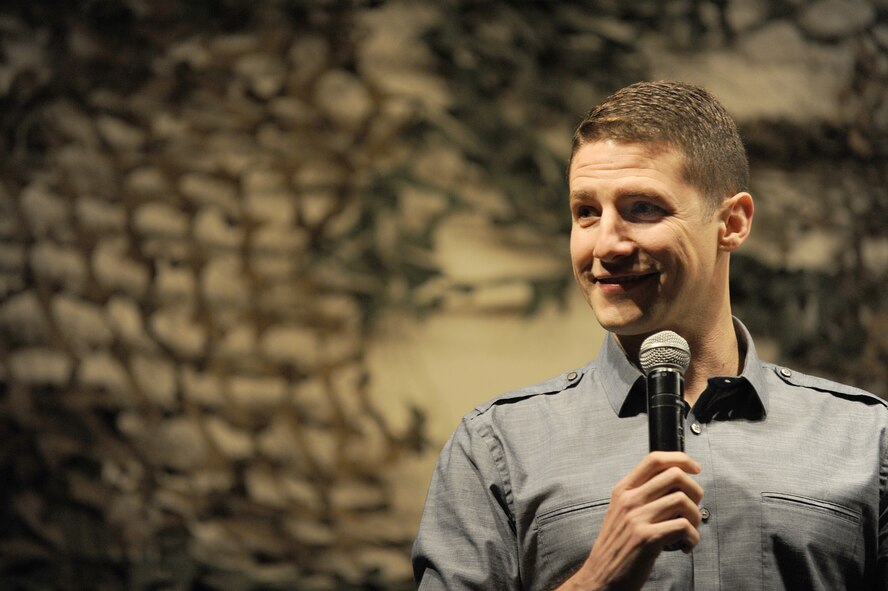 Jose Sarduy performs at the Jimmy Doolittle Center at Minot Air Force Base, N.D. Sept. 26, 2015. Sarduy is part of the GIs of Comedy who travel to different bases and locations all over the world to perform for troops. (U.S. Air Force photo by Staff Sgt. Chad Trujillo) 