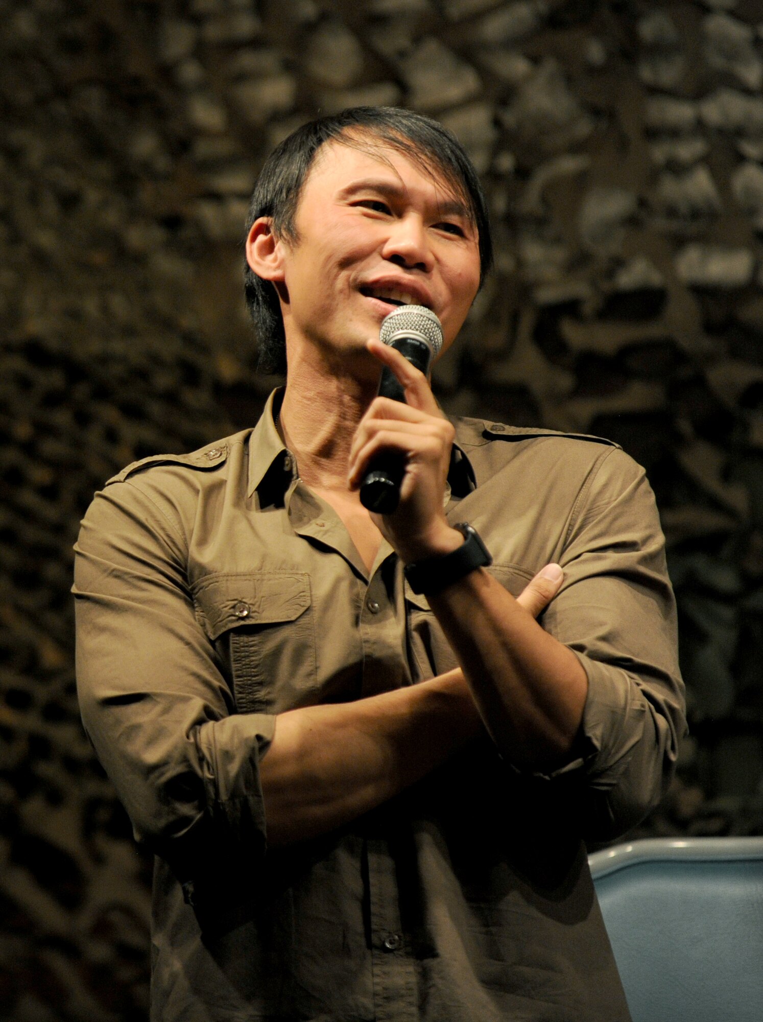 Thom Tran performs at the Jimmy Doolittle Center at Minot Air Force Base, N.D. Sept. 26, 2015. Tran is part of the GIs of Comedy who travel to different bases and locations all over the world to perform for troops. (U.S. Air Force photo by Staff Sgt. Chad Trujillo) 