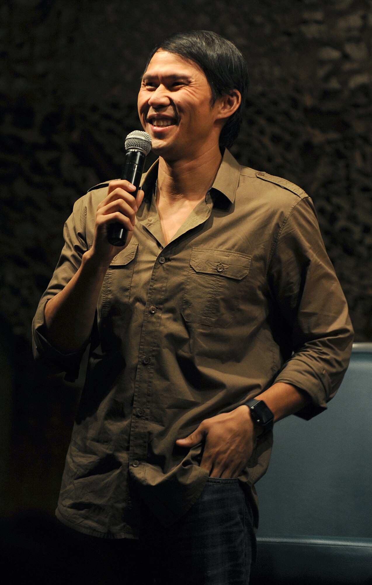 Thom Tran performs at the Jimmy Doolittle Center at Minot Air Force Base, N.D. Sept. 26, 2015. Tran is part of the GIs of Comedy who travel to different bases and locations all over the world to perform for troops. (U.S. Air Force photo by Staff Sgt. Chad Trujillo) 