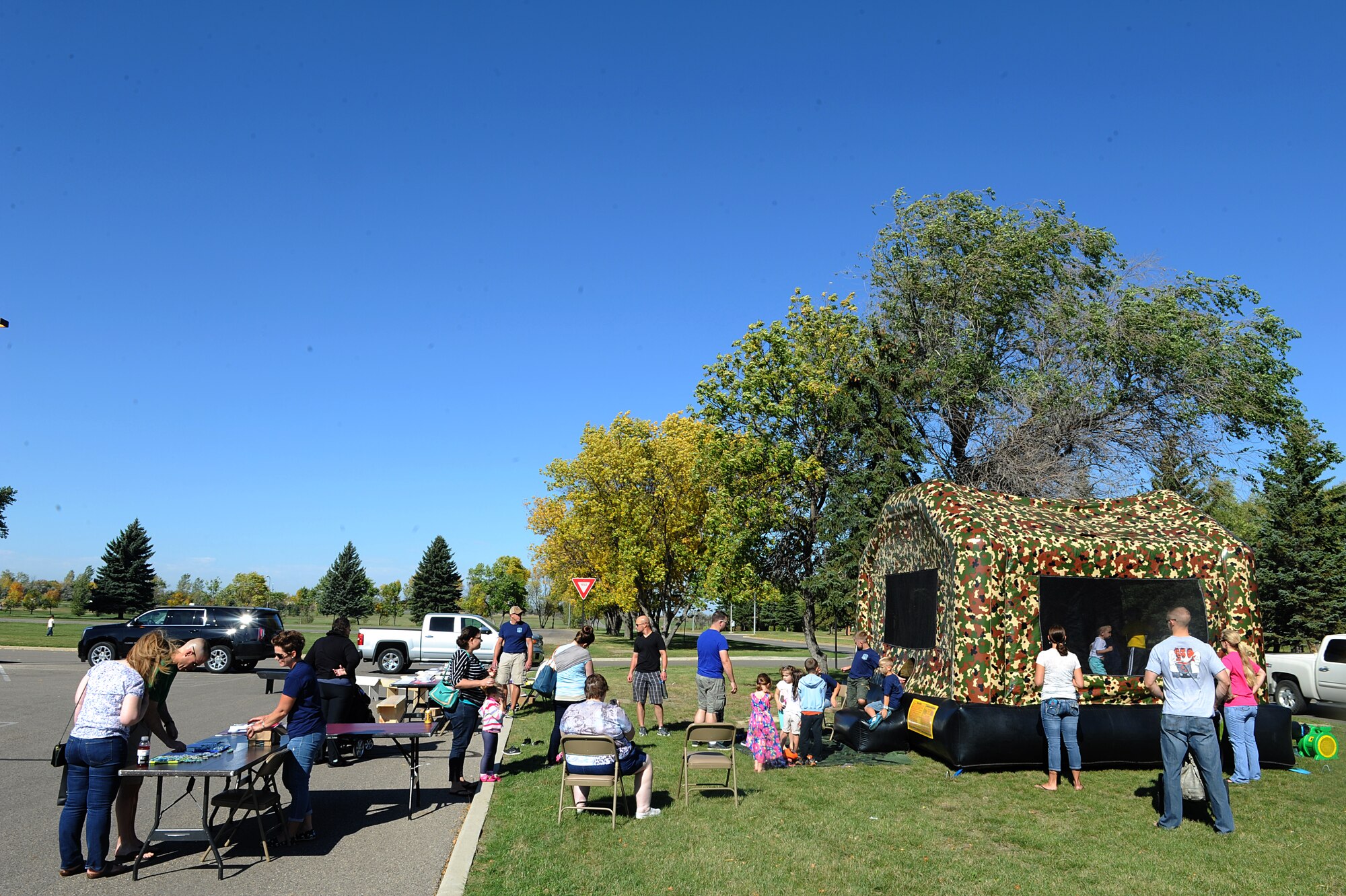 Airmen and their families from Minot Air Force Base participate in different activities at the fall festival at Minot Air Force Base, N.D. Sept. 26, 2015. The fall festival was hosted by the 91st Missile Wing and had several different fundraising activities for Airmen and their families on the base. (U.S. Air Force photo by Staff Sgt. Chad Trujillo)


