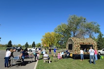 Airmen and their families from Minot Air Force Base participate in different activities at the fall festival at Minot Air Force Base, N.D. Sept. 26, 2015. The fall festival was hosted by the 91st Missile Wing and had several different fundraising activities for Airmen and their families on the base. (U.S. Air Force photo by Staff Sgt. Chad Trujillo)


