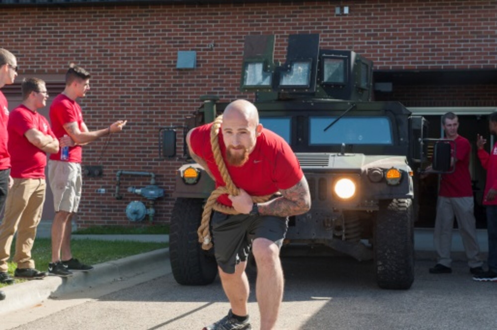 A Minot member tosses a beanbag during a game of corn hole for sports day at Minot Air Force Base, N.D., Sep. 21, 2015. Sports day consisted of several team events throughout the day that helped promote wingmanship and team-building. (U.S. Air Force photo/Airman 1st Class Christian Sullivan)